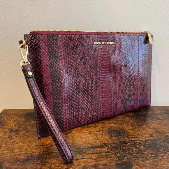 Michael Kors Handbags - Michael Kors Burgundy Snake Print Clutch
